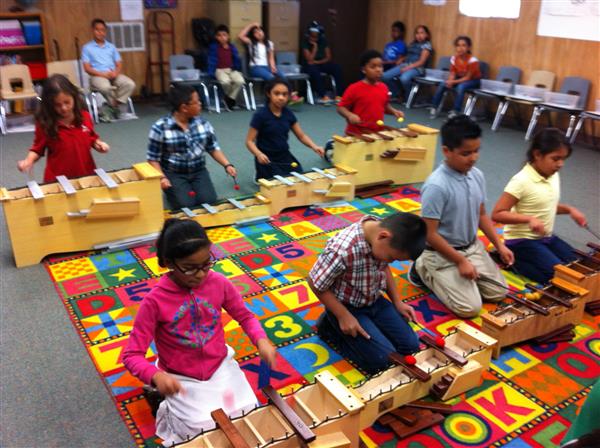 Students playing instruments