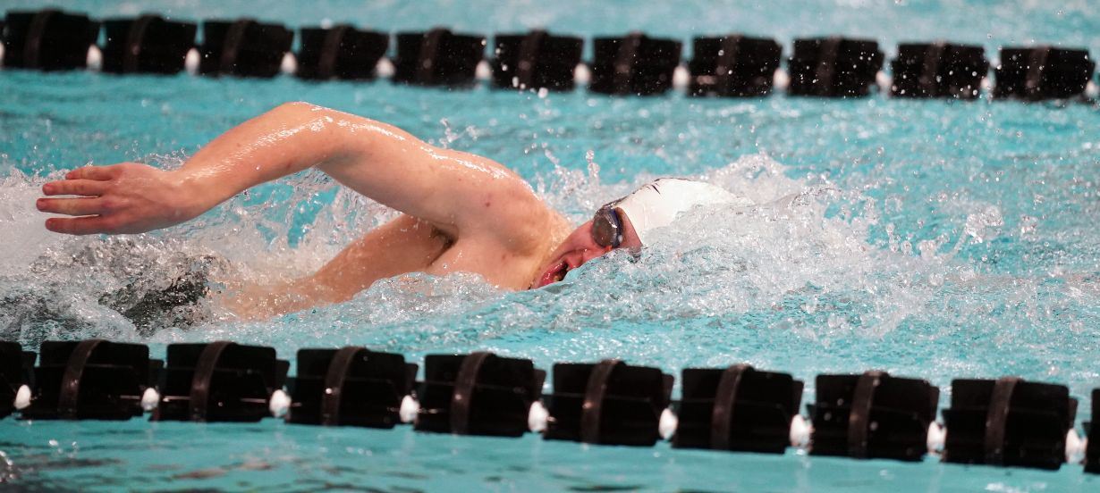  Taking a breath in the freestyle at the meet