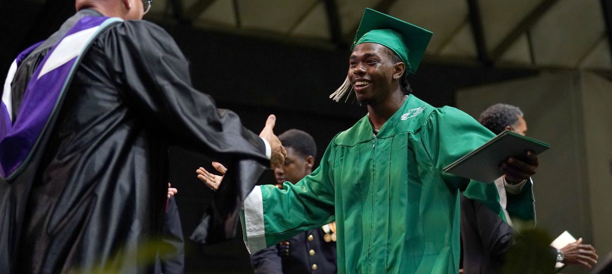  Excited to receive his EHS diploma