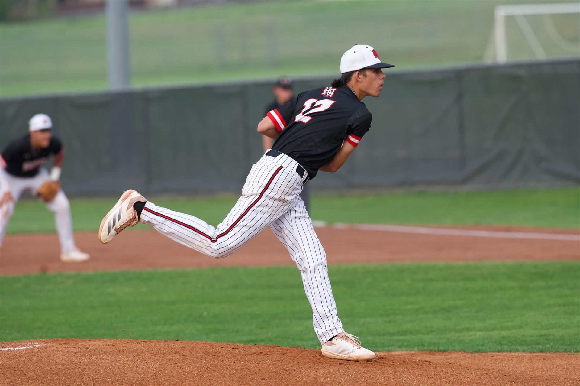 Heights baseball pitcher throws