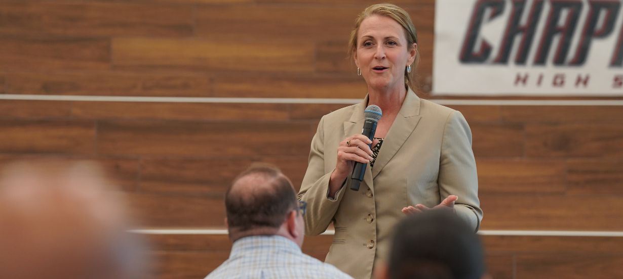  Dr. Fey speaks at a meeting