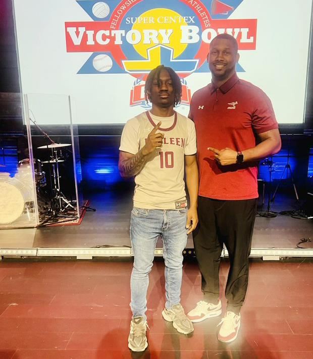 FCA coach, player pose