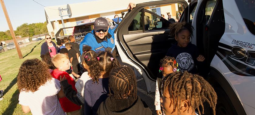  Students meet police officers, step through vehicles