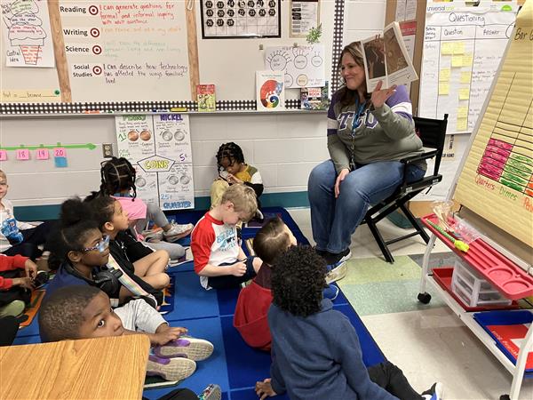 Principal Baumann reading to class