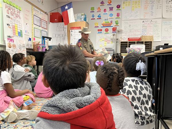 Guest reader, Mr. Washko, reading to class