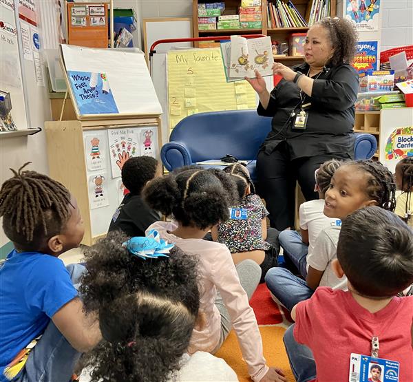 A.P. Chastain reading to classes