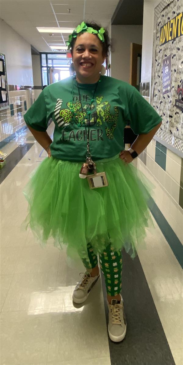 photo of staff wearing green to celebrate luck